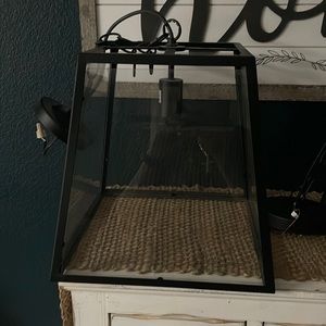 Ceiling mounted drop light.